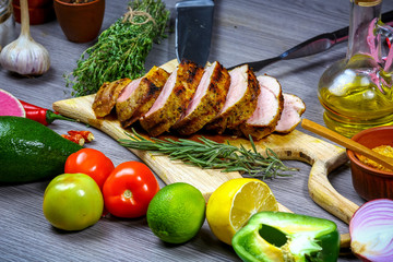 Border of grilled meat with vegetables on rustic table with copy space, top view. cooking recipe
