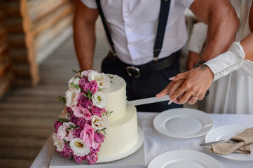 Fototapeta na wymiar Wedding cake with flowers. Wedding Celebration. Happy
