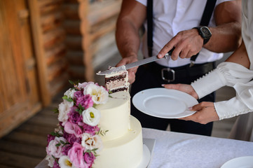 Obraz na płótnie Canvas Wedding cake with flowers. Wedding Celebration. Happy