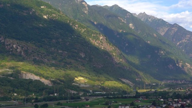 Panorama view of the little town Biasca, between Swiss mountains in Tessin, Switzerland