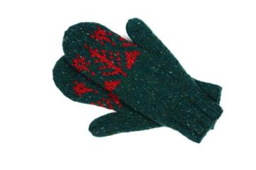 Knitted mittens of green color isolated on white background. Handwork. View from above.