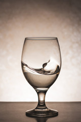 Nice clean water splashes in a glass