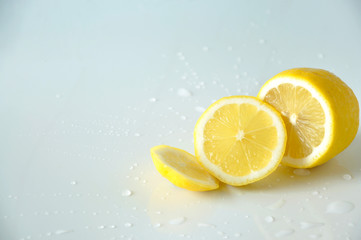 Half of Fresh Lemon Pieces on White Background