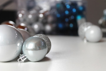 Silver christmas balls on white background