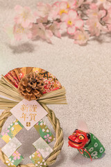 Japanese New Year's Cards with golden ideograms Gingashinnen which means Happy New Year with cute traditional Shinto folklore lion Shishimai and cherry blossoms on silver background.