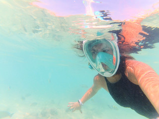 woman snorkeling in the sea