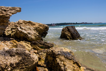Fototapeta na wymiar Sea waves crashing on the rocks. Black sea. Bulgaria