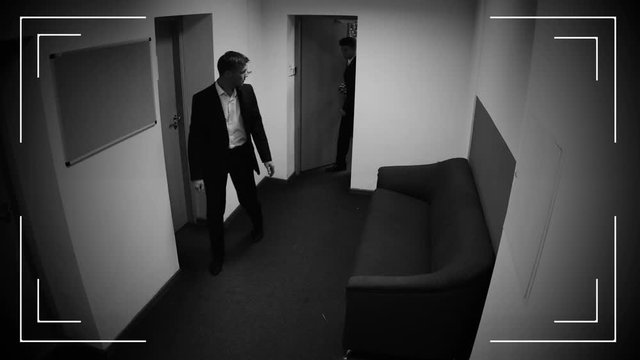 Woman almost catching co-workers making illegal deal, bribe, CCTV camera effect
