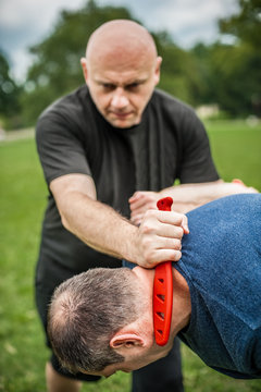 Knife vs knife. Kapap instructor demonstrates fighting and disarming technique