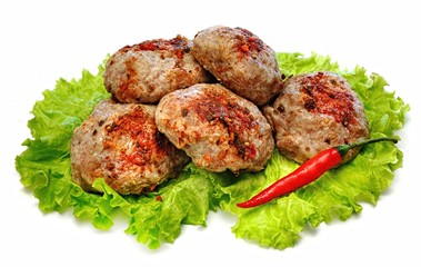 Meat patties on a white background