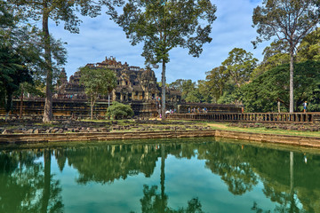 Fototapeta na wymiar SIEM REAP, CAMBODIA - 13 December 2014:View of Baphuon temple at Angkor Wat complex is popular tourist attraction, Angkor Wat Archaeological Park in Siem Reap, Cambodia UNESCO World Heritage Site