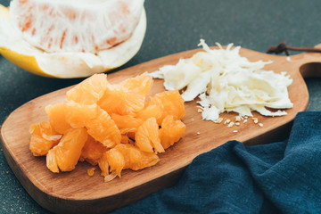 Honey pomelo pulp on the chopping board