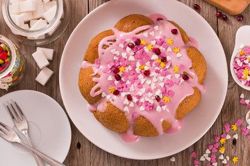 Cake with pink frosting.