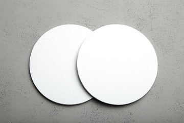 Empty beer coaster for bar. Space for drink logo. © Andrii Zastrozhnov