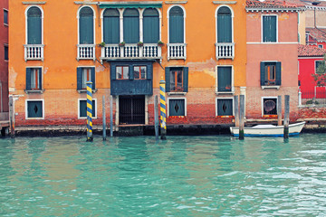 Fototapeta na wymiar Close up of canals in Venice. Traditional view with canal and palace in Venice. Venice, Italy