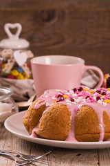 Cake with pink frosting.