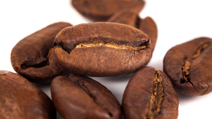roasted coffee beans isolated on white background