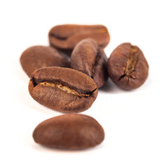 roasted coffee beans isolated on white background