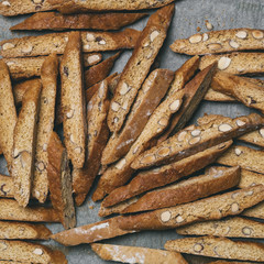 Italian biscuits Biscotti laid out randomly on a baking sheet.