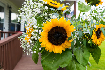 Yellow Sunflower with Baby's Breath & Green Leaf Accents
