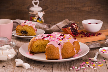 Cake with pink frosting.