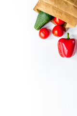 Store concept with vegetables and paper bag table background top