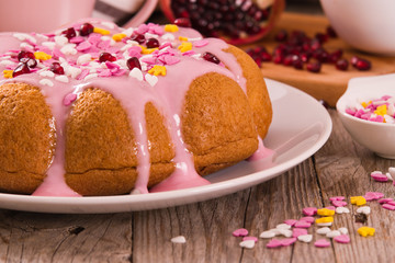 Cake with pink frosting.