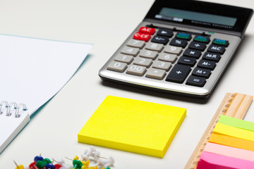 School and office supplies over office table. Top view with copy space
