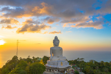 aerial view sunset at Phuket big Buddha viewpoint. Phuket Big Buddha is one of the island most important and revered landmarks on Phuket island.. © Narong Niemhom