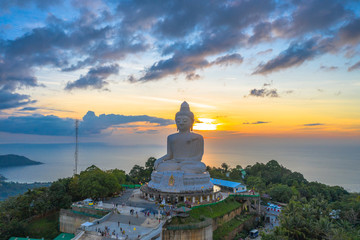 aerial view sunset at Phuket big Buddha viewpoint. Phuket Big Buddha is one of the island most important and revered landmarks on Phuket island.. © Narong Niemhom