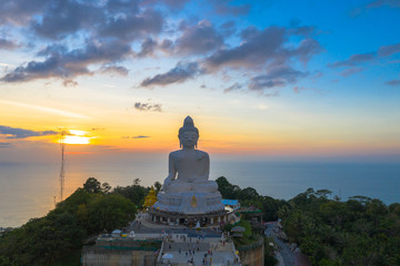 aerial view sunset at Phuket big Buddha viewpoint. Phuket Big Buddha is one of the island most important and revered landmarks on Phuket island.. © Narong Niemhom