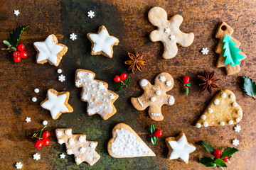 Homemade gingerbread cookies on vintage background.