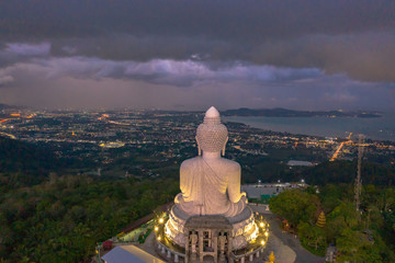aerial view Phuket big Buddha in twilight. Phuket Big Buddha is one of the island most important and revered landmarks on Phuket island.. © Narong Niemhom