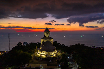aerial view Phuket big Buddha in twilight. Phuket Big Buddha is one of the island most important and revered landmarks on Phuket island.. © Narong Niemhom