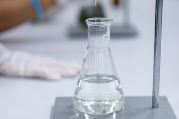 Titration technique in the laboratory.