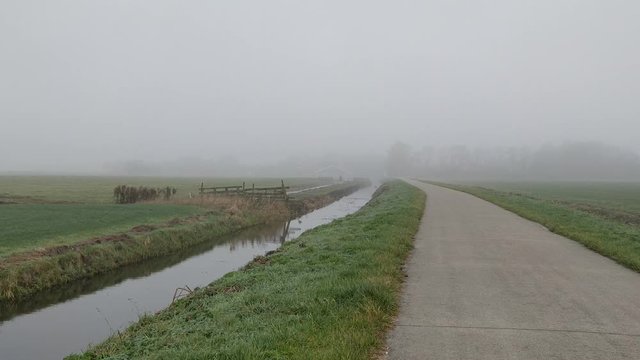 Village in the mist Friesland Neherlands Boksum