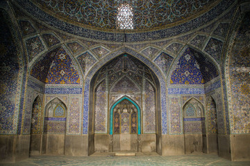 Fototapeta na wymiar Isfahan, Iran - May 11, 2017:Mosque in Isfahan blue. Traditional ornaments and decorations. Iran