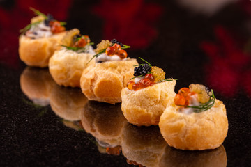 Profiteroles with a mushrooms stuffing 