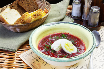 Red egg soup in a plate