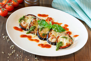 Salad on a white plate on a wooden table