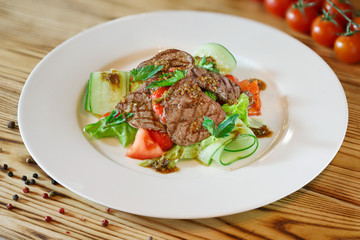 Steak on white plate