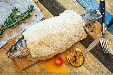 Fish in salt on the board