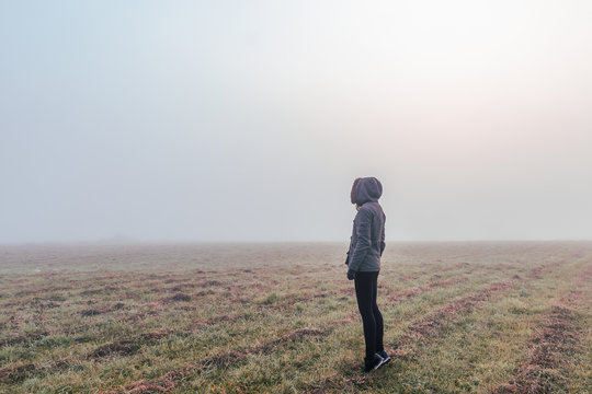 A woman looking into empty space