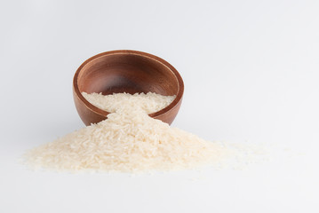 Jasmine rice or Thai Hom mali rice in wood cup on white background