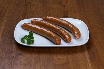 boiled sausages on a plate
