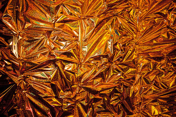 GOLD crumpled shining paper Texture background With Copy Space for your text