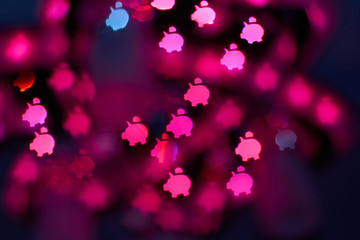 Abstraction of the blurred pink piglets bokeh on the background