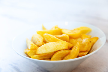 Golden French fries potatoes ready to be eaten