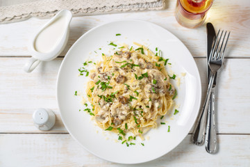 Spaghetti with mushrooms in cream sauce