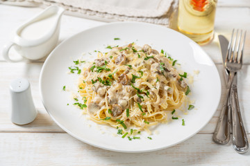 Spaghetti with mushrooms in cream sauce